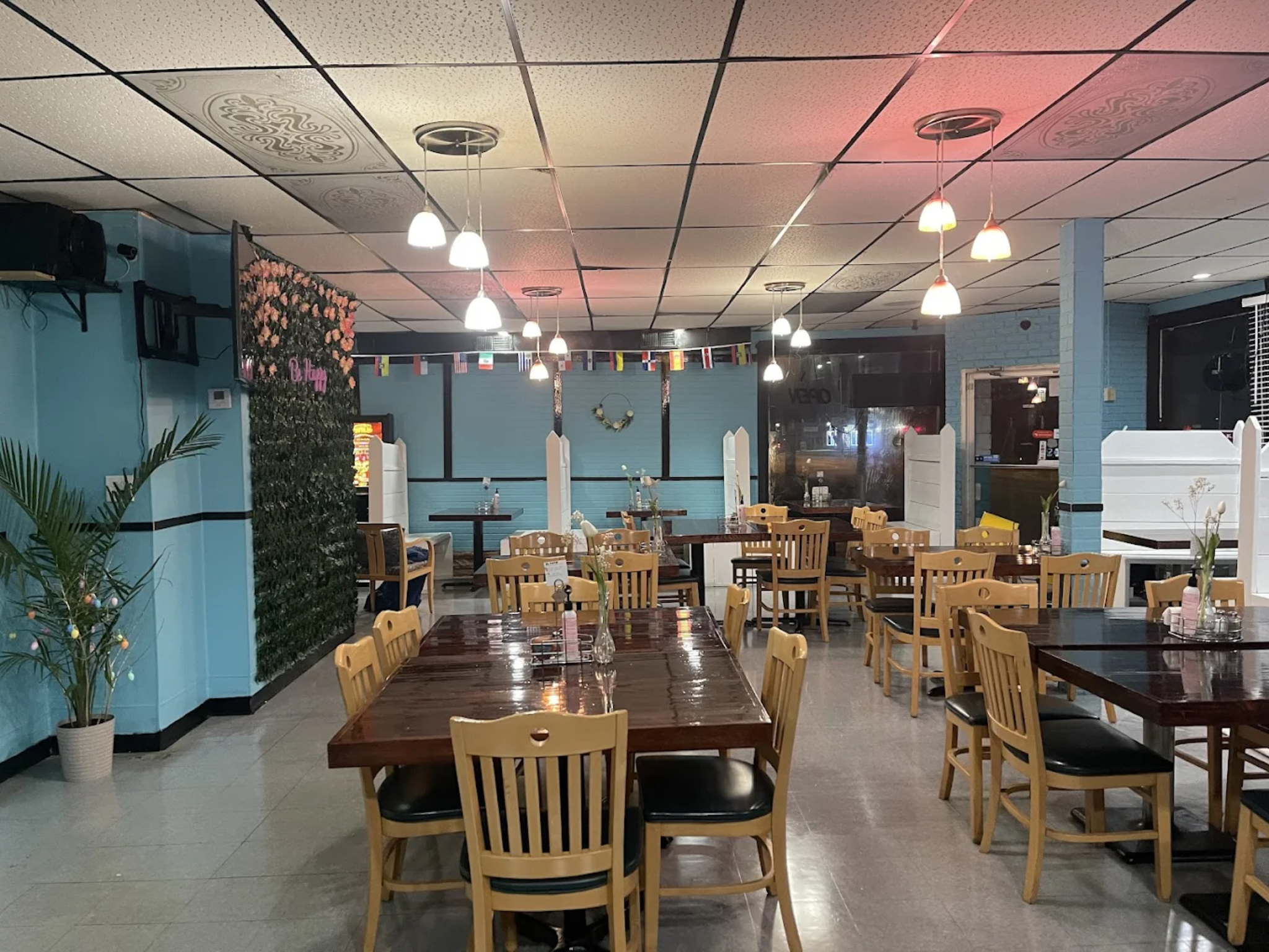 El Patio Restaurant dining area with wooden tables and warm lighting